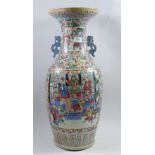 A Chinese large Canton vase painted reserves of Samuri warriors on a floral ground, restored to rim,