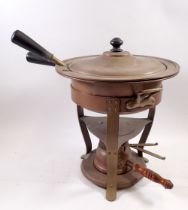 A copper fondue set with burner by Bazar Francais, New York