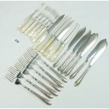 A set of six mother of pearl handled tea knives and forks and six silver plated fish knives and