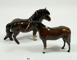 A Beswick Shetland pony and a brown horse