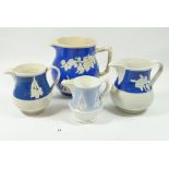 Four various Victorian jugs with applied decoration, tallest 19cm