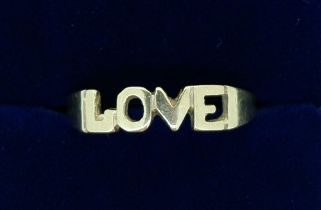 A 9 carat gold 'Love' ring, 1.9g, size N