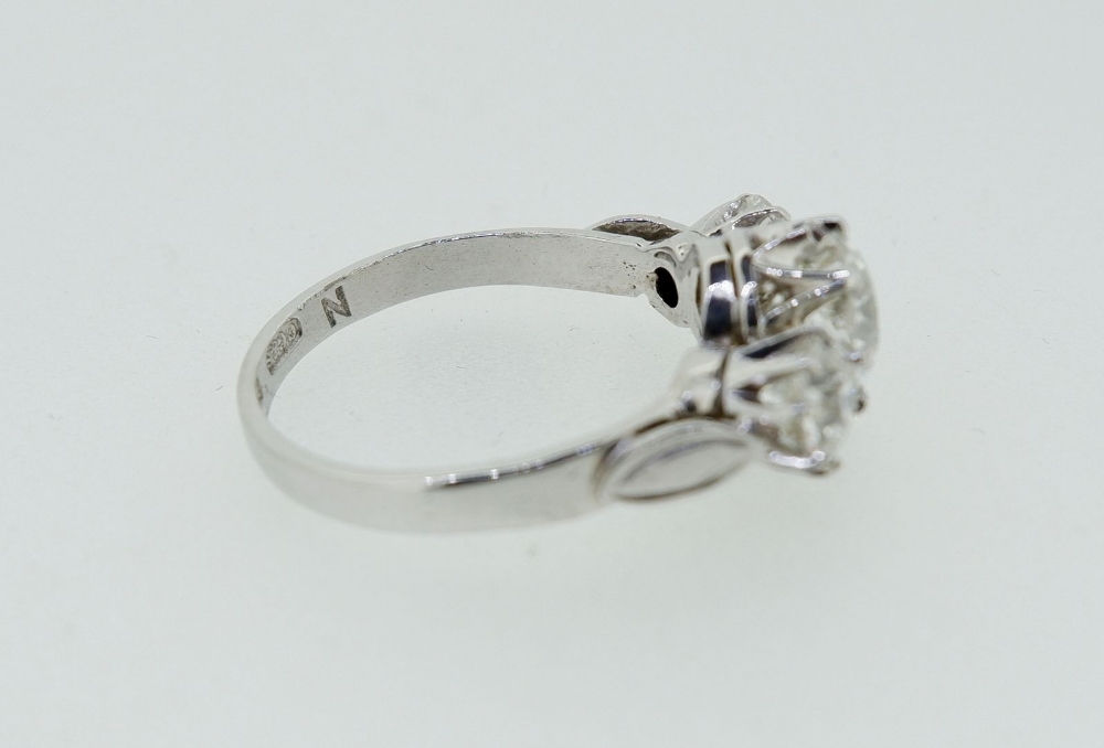 A fine quality platinum set three stone diamond ring, 2.5 cts in total, size M - Image 7 of 9