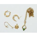 A 9ct gold pendant set green stones on 9ct gold chain, 2.9g plus a pair of 9ct gold earrings etc 1g