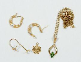 A 9ct gold pendant set green stones on 9ct gold chain, 2.9g plus a pair of 9ct gold earrings etc 1g