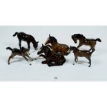 A group of six Beswick brown foals