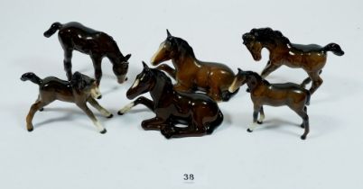 A group of six Beswick brown foals