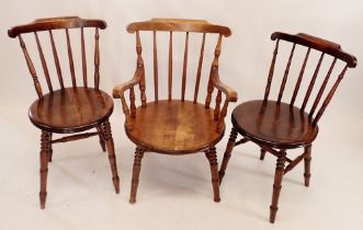 Three early 20th century beech stick back chairs (one carver and two carvers)