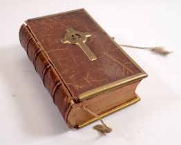 A Victorian leather and brass bound prayer book published by Eyre & Spottishwoode