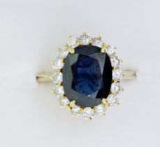 An 18 carat gold diamond and sapphire cluster ring, not marked - size Q to R