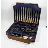 A silver plated cutlery set in fitted oak case, 42 x 33cm
