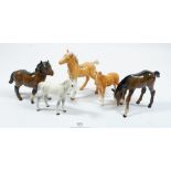 A collection of five Beswick foals