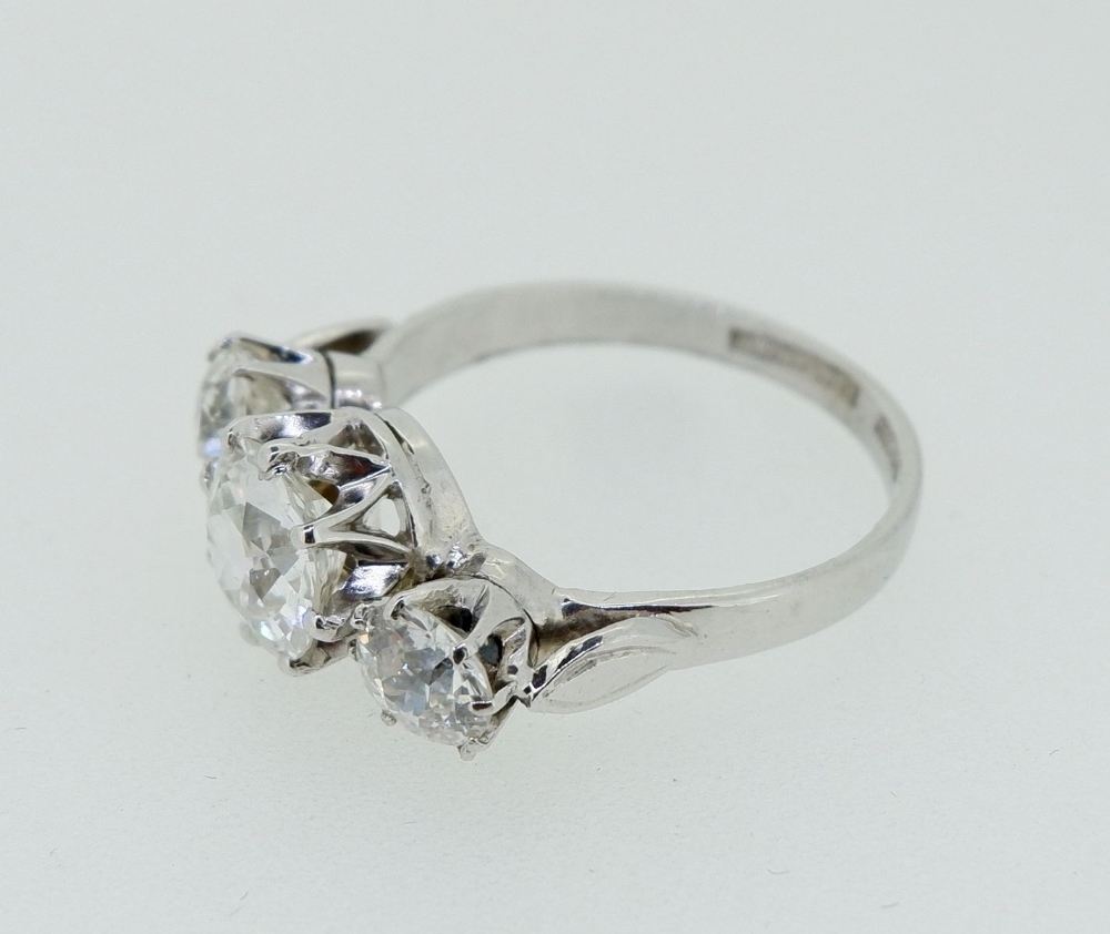 A fine quality platinum set three stone diamond ring, 2.5 cts in total, size M - Image 4 of 9