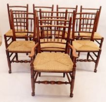 A good quality set of eight Brynhall rush seated spindle back country style dining chairs