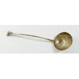 A Georgian silver shell bowl ladle - marks rubbed, 164g, 32cm long