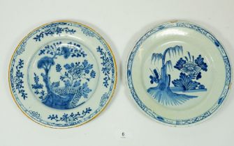 Two 18th century Delft plates painted Chinoiserie landscapes, largest 23cm diameter