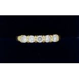 An 18 carat gold five stone diamond ring, size N to O