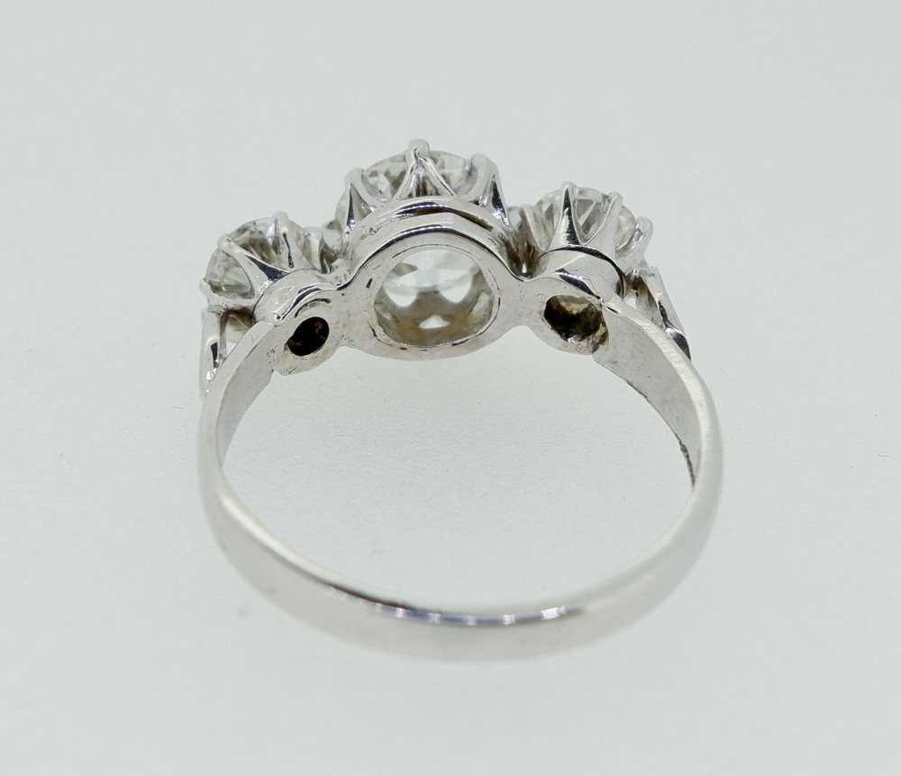 A fine quality platinum set three stone diamond ring, 2.5 cts in total, size M - Image 6 of 9