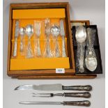 Twelve Ashberry silver plated kings pattern cutlery place settings cased in wood framed display