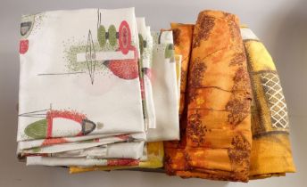 A box of retro fabrics dating from the 1960's together with two pairs of retro Prova fibreglass