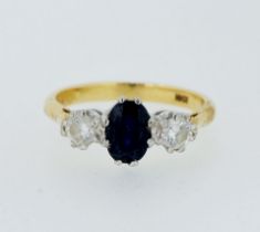 An 18 carat gold sapphire and diamond ring, size O, 4.1g
