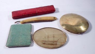 A shagreen style cigarette case, a brass compact, a brass framed photograph of a ship and a cut