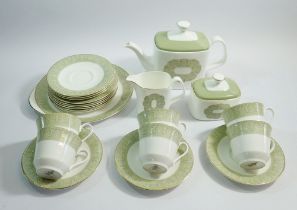 A Royal Doulton Sonnet tea service comprising six cups and saucers, teapot, jug, sugar, six tea