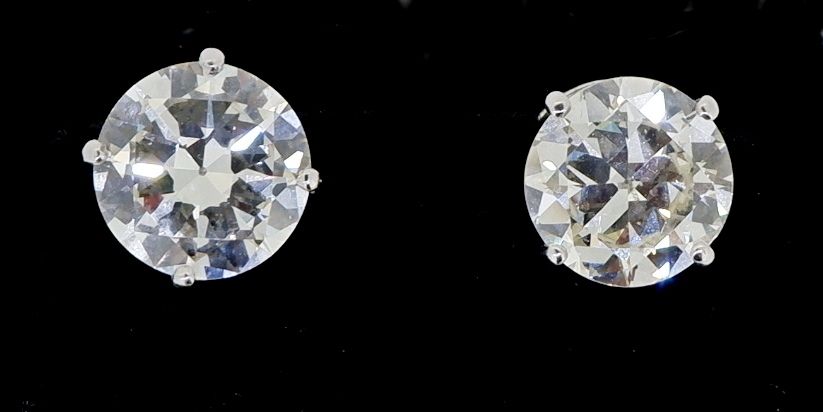 A pair of large 18 carat white gold diamond stud earrings, total 5.2 carats with screw backs - Image 2 of 4