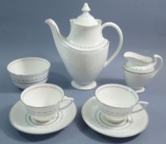 A Royal Doulton Tiara coffee service comprising coffee pot, six cups and saucers, six tea plates,