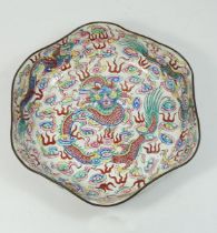 A Chinese Canton enamel lobed bowl decorated dragon to interior and flowers to exterior, 31cm