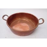 A 19th century two handled copper preserving pan