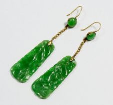 A pair of Art Deco carved jade earrings, jade panel 3.2 x 1.3cm
