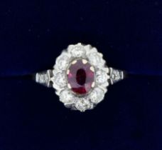 An antique 18 carat gold ruby and diamond oval cluster ring, size L to M, cluster 1.2 x 1cm