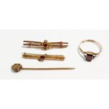 A 15 carat gold stick pin set chip diamond, two 9 carat gold bar brooches and a 9 carat gold