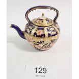 A Royal Crown Derby miniature tea kettle, 6.5cm tall