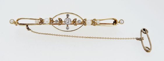 An antique 15 carat gold bar brooch set diamonds and pearls, unmarked, 6g, 7cm long