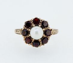 A 9 carat gold pearl and garnet cluster ring, size K to L, 3.3g