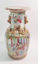 A large 19th century Canton famille rose vase painted panels of birds, flowers and figures, with