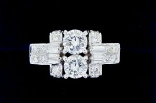 A vintage Art Deco style 14 carat gold ring set brilliant and baguette cut diamonds, size I to J,