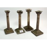 A set of four late 19th century silver plated corinthian column candlesticks, 24cm tall