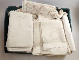 A box of various table linen
