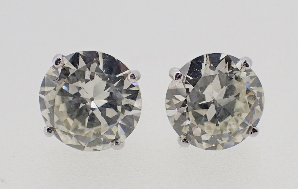 A pair of large 18 carat white gold diamond stud earrings, total 5.2 carats with screw backs - Image 3 of 4