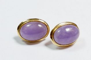A pair of 14 carat gold lilac jade oval earrings