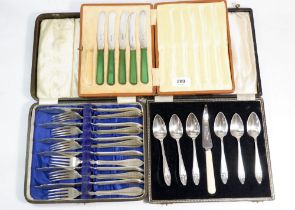 A silver plated fish cutlery set, a silver plated grapefruit set and a set of green handled tea