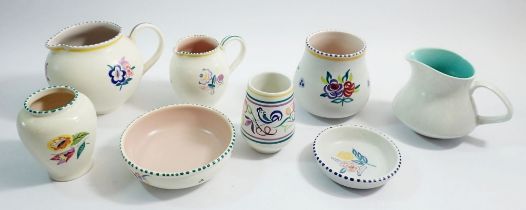 A collection of Poole Pottery jugs, vases and dishes (8)