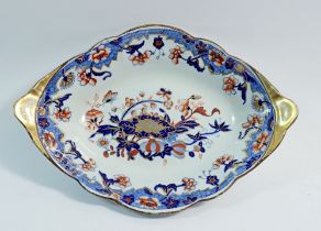 A 19th century New Stone oval dish decorated in the Imari pallette, 26 x 18cm