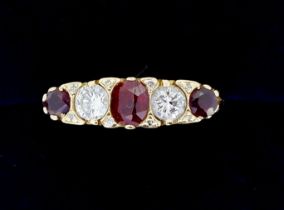 An 18 carat gold ruby and diamond ring, size P to Q, 4.7g