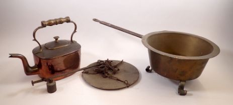 A Victorian copper kettle, a brass pan on scroll feet and an antique balance scale