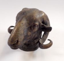 A bronze rams head wall plaque, 14cm deep