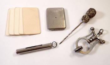 A group of small collectables including skirt lifter, cased egg timer, blank calling cards etc.